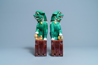 A pair of tall Chinese sancai-glazed biscuit models of Buddhist lions, 19/20th C.