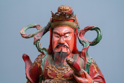 A large polychromed wooden figure of a guardian, China or Vietnam, 19th C.