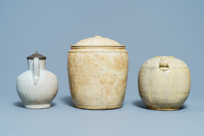 A Chinese celadon-glazed 'Jue' ewer, a qingbai-glazed wine ewer and a storage vessel, Song/Yuan