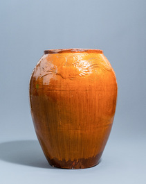 A massive Chinese brown-glazed 'dragon and phoenix' martaban jar, Qing