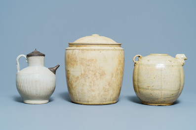 A Chinese celadon-glazed 'Jue' ewer, a qingbai-glazed wine ewer and a storage vessel, Song/Yuan