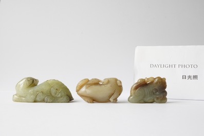 Five Chinese celadon and russet jade carvings, 19th C.