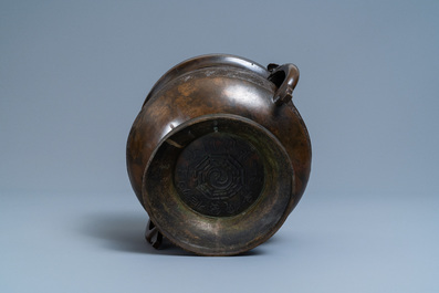 A large Chinese bronze 'Gui' vessel on hardwood stand, Yuan