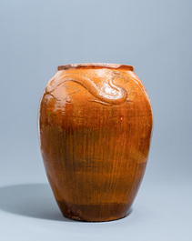 A massive Chinese brown-glazed 'dragon and phoenix' martaban jar, Qing