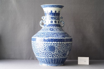 A large Chinese blue and white 'hu' vase with floral scrolls, Qianlong mark, 19th C