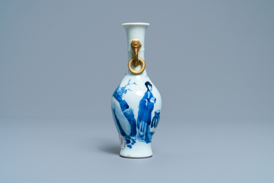 A Chinese blue and white vase with gilt elephant-head handles, Kangxi