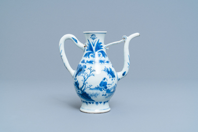 A Chinese blue and white ewer with figures in a landscape, Transitional period