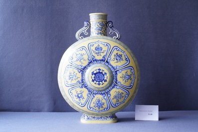 A Chinese yellow-ground blue and white 'Bajixiang' moonflask vase, Yongzheng mark, 19/20th C.