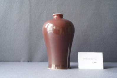 A Chinese monochrome dark copper red meiping vase, Qianlong mark and of the period
