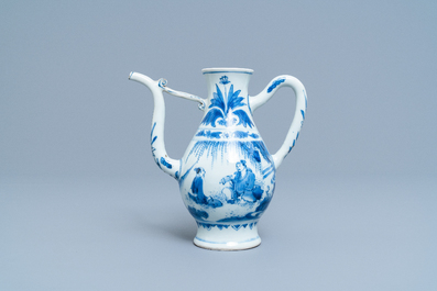 A Chinese blue and white ewer with figures in a landscape, Transitional period