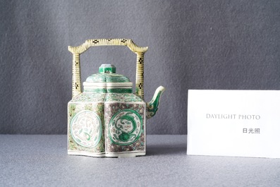 A Chinese verte biscuit teapot and cover, Kangxi