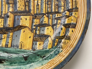 A large Italian maiolica dish with a view on San Gimignano, Deruta, 16/17th C.