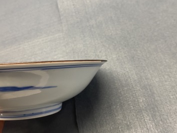 A fine Chinese blue and white Xi Xiang Ji 'temple scene' shallow bowl, Jiajing mark, Kangxi