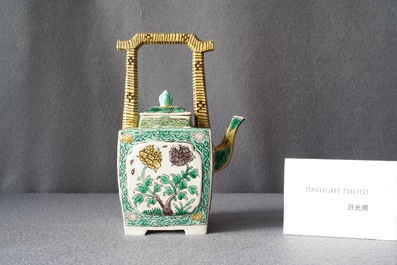 A Chinese verte biscuit teapot and cover, Kangxi