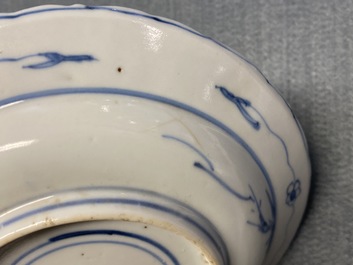 A Chinese blue, white and copper red 'fish' plate, Chenghua mark, Kangxi