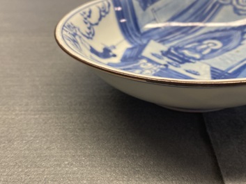 A fine Chinese blue and white Xi Xiang Ji 'temple scene' shallow bowl, Jiajing mark, Kangxi