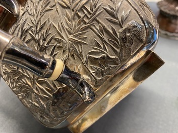 A large Chinese silver teapot and cover, 19th C.