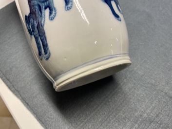 A pair of Chinese blue and white 'mythical beasts' vases and a pear-shaped 'dragon and phoenix' vase, 19th C.