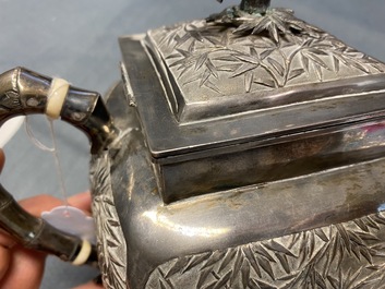 A large Chinese silver teapot and cover, 19th C.