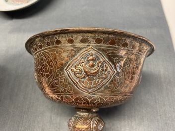 A pair of Tibetan silvered copper alloy altar bowls, 19/20th C.