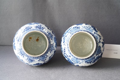 A pair of Chinese blue and white 'hunting scene' jars and covers, Kangxi