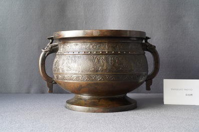 A large Chinese bronze 'Gui' vessel on hardwood stand, Yuan