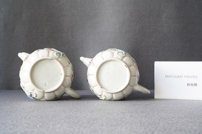 A pair of Chinese famille rose relief-decorated teapots and covers, Yongzheng