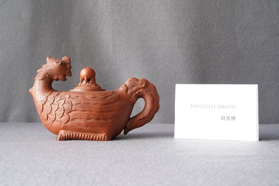 A Chinese Yixing 'phoenix' stoneware teapot and cover, Kangxi