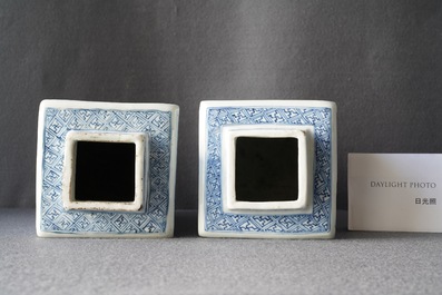 A pair of Chinese blue and white square vases and covers, Kangxi