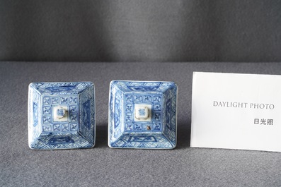 A pair of Chinese blue and white square vases and covers, Kangxi