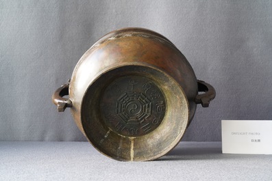 A large Chinese bronze 'Gui' vessel on hardwood stand, Yuan