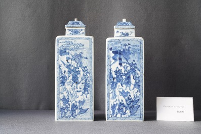 A pair of Chinese blue and white square vases and covers, Kangxi