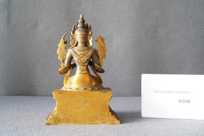 A Chinese gilt bronze figure of Buddha, 18/19th C.