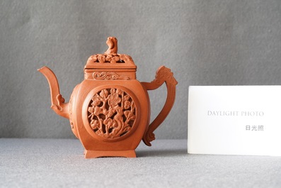 A Chinese reticulated Yixing stoneware teapot and cover, Kangxi