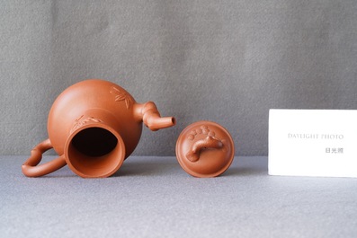 A pair of Chinese Yixing stoneware teapots and covers, Kangxi