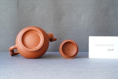 A pair of Chinese Yixing stoneware teapots and covers, Kangxi