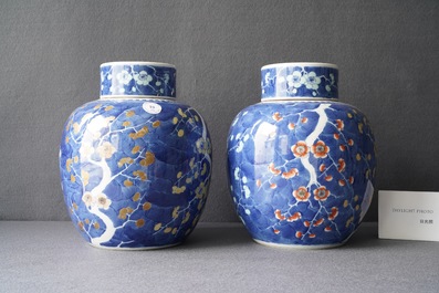 A pair of Chinese polychrome 'prunus on cracked ice' jars and covers, 19th C.