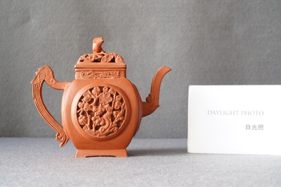 A Chinese reticulated Yixing stoneware teapot and cover, Kangxi