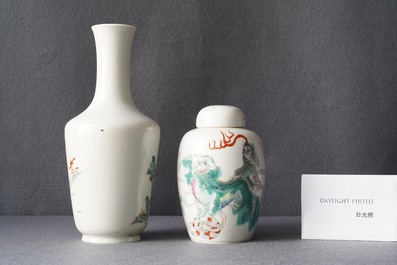 A Chinese famille rose vase and a covered jar with Buddhist lions, 19/20th C.