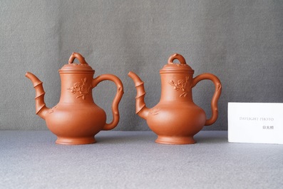 A pair of Chinese Yixing stoneware teapots and covers, Kangxi