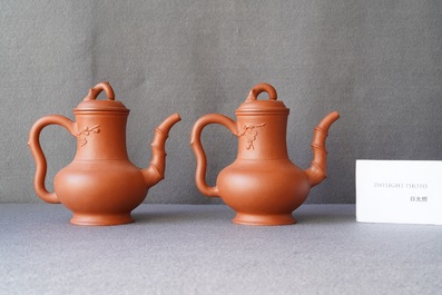 A pair of Chinese Yixing stoneware teapots and covers, Kangxi