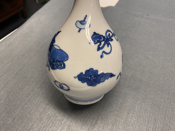 A Chinese blue and white 'antiquities' bottle vase, Kangxi
