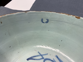 A blue and white English Delftware bowl dated 1684