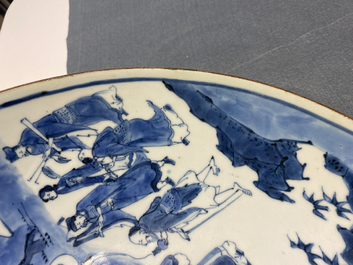 Un plat en porcelaine de Chine en bleu et blanc &agrave; d&eacute;cor d'immortels, marque Yu Tang Jia Qi, Shunzhi