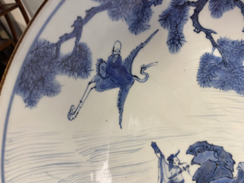 A Chinese blue and white 'Immortals' dish, Yu Tang Jia Qi mark, Shunzhi