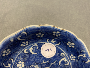 A Chinese blue and white 'galloping horse' dish, Jiajing mark, Kangxi