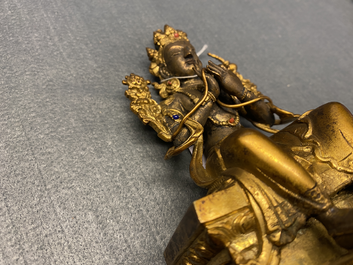 Une figure de Bouddha en bronze dor&eacute; et incrust&eacute;, Chine, 18/19&egrave;me