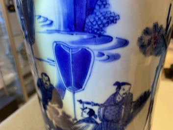 A Chinese blue and white rouleau vase with figures in a landscape, Transitional period