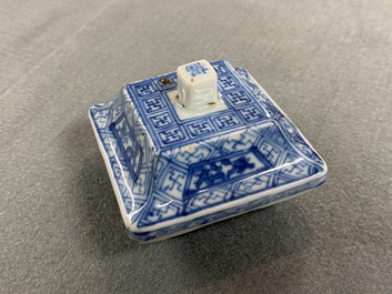 A pair of Chinese blue and white square vases and covers, Kangxi