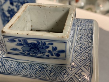 A pair of Chinese blue and white square vases and covers, Kangxi